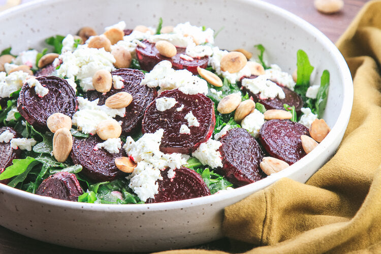 Bald Eagle Foods Sweet Baby Beets salad with arugula, goat cheese, and toasted Marcona almonds