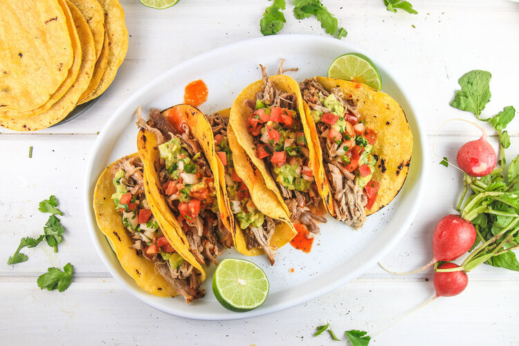 Pork carnitas tacos topped with Bald Eagle Foods Cherry Salsa